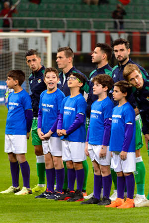MILAN - OCT 25, 2018: Betis players listen the athem. AC Milan - Betis. UEFA Europe League. Giuseppe Meazza stadium.のeditorial素材