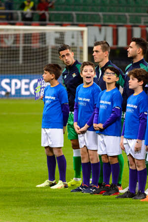 MILAN - OCT 25, 2018: Betis players listen the athem. AC Milan - Betis. UEFA Europe League. Giuseppe Meazza stadium.のeditorial素材