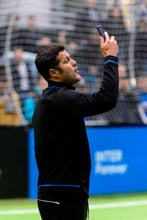 Milan - Nov 6. 2018: Julio Cesar does selfie with his iPhone. Friendly match Inter Forever - Barca Legendsのeditorial素材