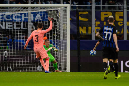 Milan - Nov 6, 2018: Gerard Pique 3 raises his hand. FC Internazionale - FC Barcelona. UEFA Champions League. Matchday 4. Giuseppe Meazza (San Siro) stadium.のeditorial素材