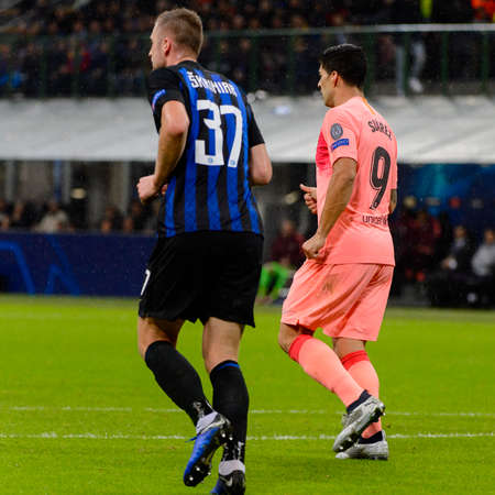 Milan - Nov 6, 2018: Milan Skriniar 37 vs Suarez. FC Internazionale - FC Barcelona. UEFA Champions League. Matchday 4. Giuseppe Meazza (San Siro) stadium.のeditorial素材