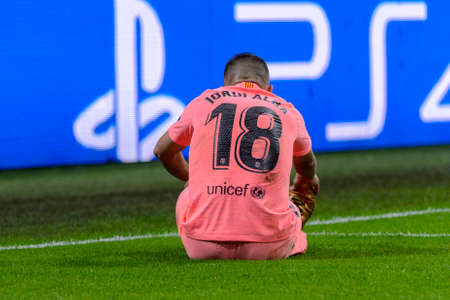 Milan - Nov 6, 2018: Jordi Alba hurt on the grass. FC Internazionale - FC Barcelona. UEFA Champions League. Matchday 4. Giuseppe Meazza (San Siro) stadium.のeditorial素材