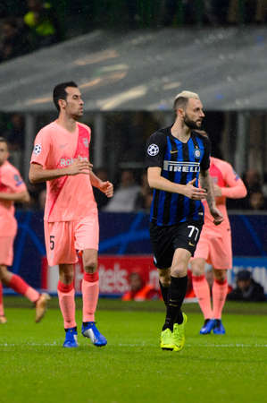 Milan - Nov 6, 2018: Sergio Busquets vs Marcelo Brozovic. FC Internazionale - FC Barcelona. UEFA Champions League. Matchday 4. Giuseppe Meazza (San Siro) stadium.のeditorial素材