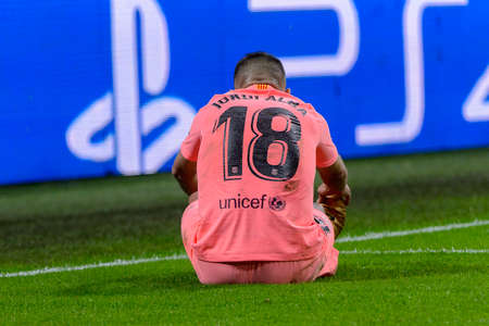 Milan - Nov 6, 2018: Jordi Alba hurt on the grass. FC Internazionale - FC Barcelona. UEFA Champions League. Matchday 4. Giuseppe Meazza (San Siro) stadium.のeditorial素材