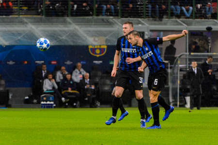 Milan - Nov 6, 2018: Stefan de Vrij 6 shoots with a head. FC Internazionale - FC Barcelona. UEFA Champions League. Matchday 4. Giuseppe Meazza (San Siro) stadium.のeditorial素材