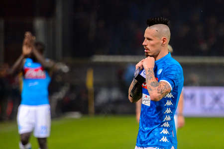 GENOVA - NOV 10, 2018: Marek Hamsik 17 gives the shirt to the boy.  C.F.C Genoa - SSC Napoli. Calcio Serie A TIM. Stadium Luigi Ferraris.のeditorial素材