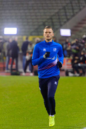 BRUSSELS - NOV 15, 2018: Iceland player warms up.  Belgium - Iceland. UEFA Nations League.のeditorial素材
