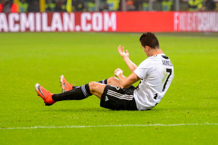 MILAN - NOV 11, 2018: Cristiano Ronaldo 7 on the grass. AC Milan - Juventus. Italian Serie A TIM. Giuseppe Meazza Stadiumのeditorial素材