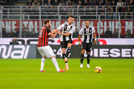 MILAN - NOV 11, 2018: Miralem Pjanic 5. AC Milan - Juventus. Italian Serie A TIM. Giuseppe Meazza Stadiumのeditorial素材