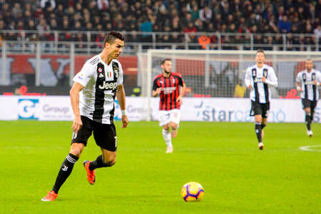 MILAN - NOV 11, 2018: Cristiano Ronaldo 7 controls the ball. AC Milan - Juventus. Italian Serie A TIM. Giuseppe Meazza Stadiumのeditorial素材