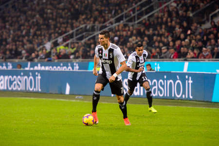 MILAN - NOV 11, 2018: Cristiano Ronaldo 7 controls the ball. AC Milan - Juventus. Italian Serie A TIM. Giuseppe Meazza Stadiumのeditorial素材