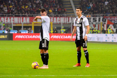 MILAN - NOV 11, 2018: Miralem Pjanic 5 is about to shoot a free kick. AC Milan - Juventus. Italian Serie A TIM. Giuseppe Meazza Stadiumのeditorial素材