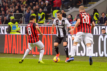 MILAN - NOV 11, 2018: Cristiano Ronaldo 7 shows his dribbling. AC Milan - Juventus. Italian Serie A TIM. Giuseppe Meazza Stadiumのeditorial素材