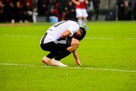 MILAN - NOV 11, 2018: Paulo Dybala 10 on the grass. AC Milan - Juventus. Italian Serie A TIM. Giuseppe Meazza Stadiumのeditorial素材