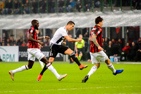 MILAN - NOV 11, 2018: Cristiano Ronaldo 7 shoots on goal. AC Milan - Juventus. Italian Serie A TIM. Giuseppe Meazza Stadiumのeditorial素材