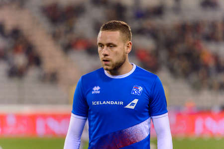 BRUSSELS - NOV 15, 2018: Sverrir Ingason 5 warms up. Belgium - Iceland. UEFA Nations League.のeditorial素材