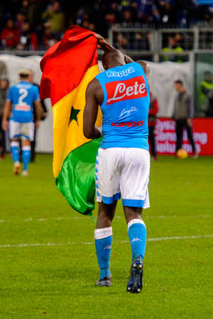 GENOVA - NOV 10, 2018: Kalidou Koulibaly 26 with Senegalese flag.  C.F.C Genoa - SSC Napoli. Calcio Serie A TIM. Stadium Luigi Ferraris.のeditorial素材