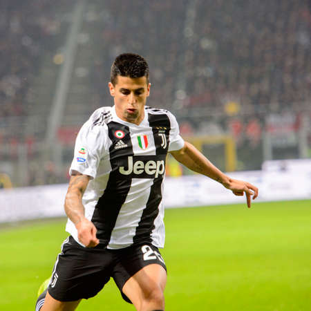 MILAN - NOV 11, 2018: Joao Cancelo 20 attacks with a ball. AC Milan - Juventus. Italian Serie A TIM. Giuseppe Meazza Stadiumのeditorial素材