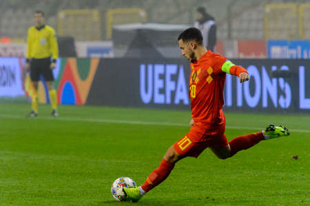 BRUSSELS - NOV 15, 2018: Eden Hazard 10 shoots on goal.  Belgium - Iceland. UEFA Nations League.のeditorial素材