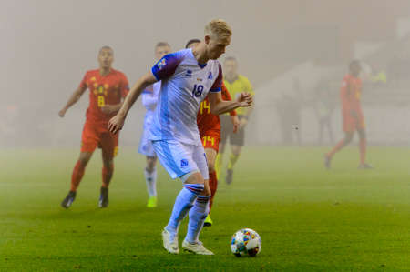 BRUSSELS - NOV 15, 2018: Hordur Magnusson 18 in action. Belgium - Iceland. UEFA Nations League.のeditorial素材