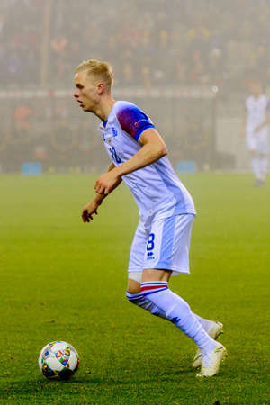 BRUSSELS - NOV 15, 2018: Hordur Magnusson 18 in action. Belgium - Iceland. UEFA Nations League.のeditorial素材