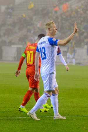 BRUSSELS - NOV 15, 2018: Hordur Magnusson 18 in action. Belgium - Iceland. UEFA Nations League.のeditorial素材