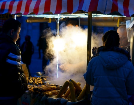 The allure of grilled corn attracts passersby in the heart of old town (sultanahmet) Istanbul.