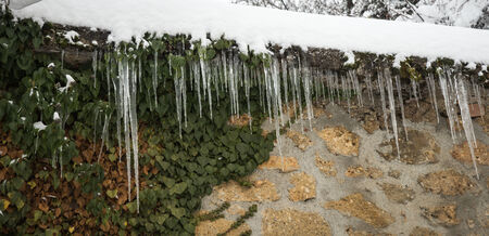 Snow-covered village in the mountains. Winter at Trikala Korinthias, Peloponnese, Greeceの写真素材