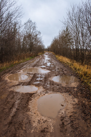 Season of bad roads. Autumn roads around Palekh, Vladimir region, Russiaの写真素材