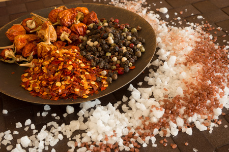 Kitchen still life with salt, pepper and spicesの写真素材