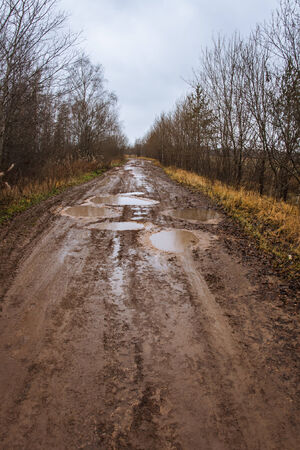 Season of bad roads. Autumn roads around Palekh, Vladimir region, Russiaの写真素材