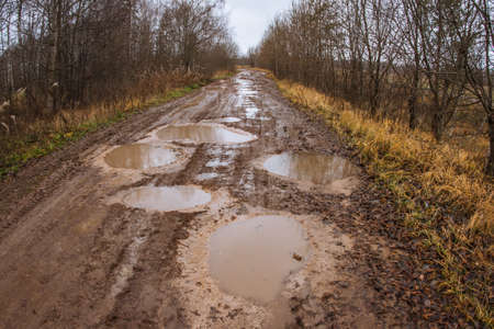 Season of bad roads. Autumn roads around Palekh, Vladimir region, Russiaの写真素材