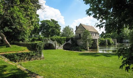 Image of a scenic village housr near the river at Vernon, Franceの写真素材