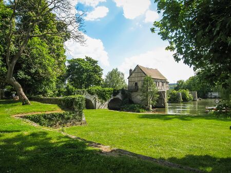 Image of a scenic village housr near the river at Vernon, Franceの写真素材