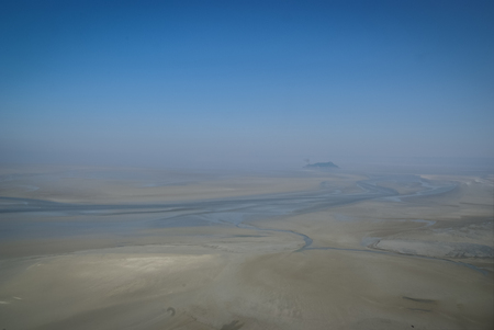 Landscape in pastel colors, quick sands, Mont Saint Michel, Franceの写真素材