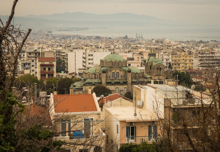 Cloudy cityscape with mountains at Patras, Peloponnese, Greeceの写真素材