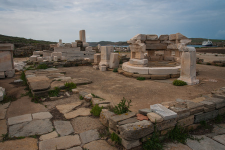 Ancient Greek ruins at the archaeological island of Delos, Cyclades, Greece