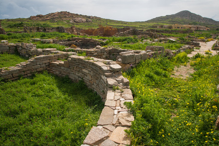 Ancient Greek ruins at the archaeological island of Delos, Cyclades, Greece
