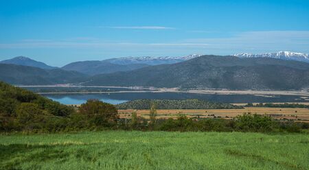 Im,age of a scenic view of the mountains and Lake Prespa, Greeceの写真素材
