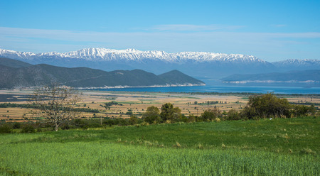 Im,age of a scenic view of the mountains and Lake Prespa, Greeceの写真素材