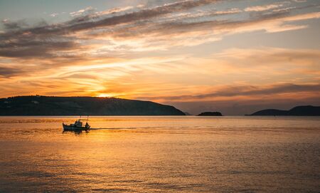Image of a bay at sunset near Methoni, Peloponnese, Greeceの写真素材