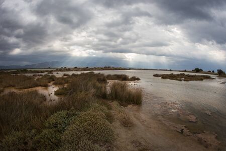 Scenic landscape with stormy clouds at Punta, Peloponnese, Greeceの写真素材