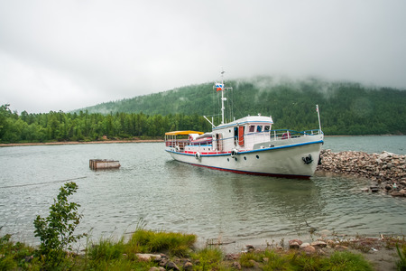 Ship near the shore at  Baikal lake, Russiaの写真素材