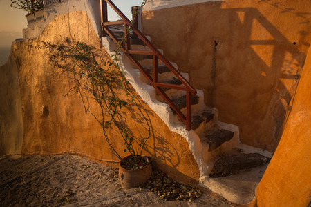 Image of Orange wall and stairs, Oia, Santorini, Greeceの写真素材