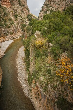 Scenic mountain autumn landscape with a river, Evitania, Greeceの写真素材