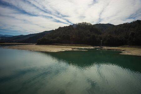Image of river with green waters near Meteora in Greeceの写真素材