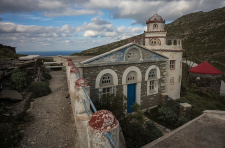 Small church at  side of road near Isternia at Tinos in Greeceの写真素材