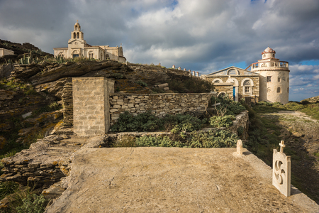 Small church at  side of road near Isternia at Tinos in Greeceの写真素材