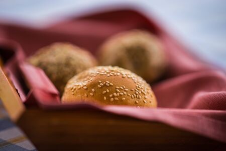 Image of buns in a basket on the tableの写真素材