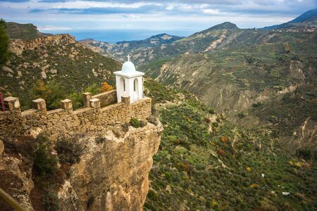 Image of Small church of Virgin Mary of shelters at  side of road on Peloponnese in Greeceの写真素材